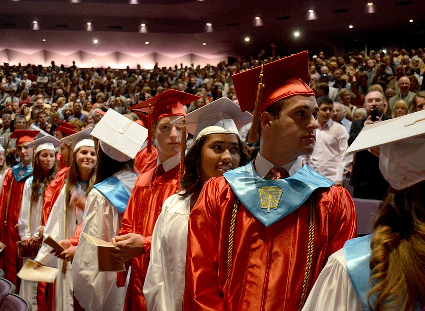 Cardinal Mooney seniors watch as classmates enter the auditorium at the Van Wezel.