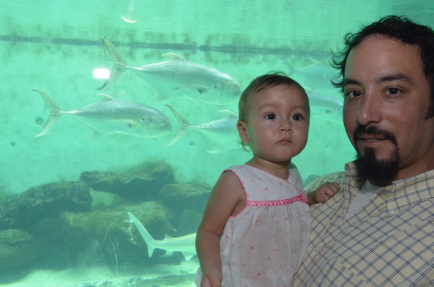 Oona Olmstead, 1, with her dad Evan