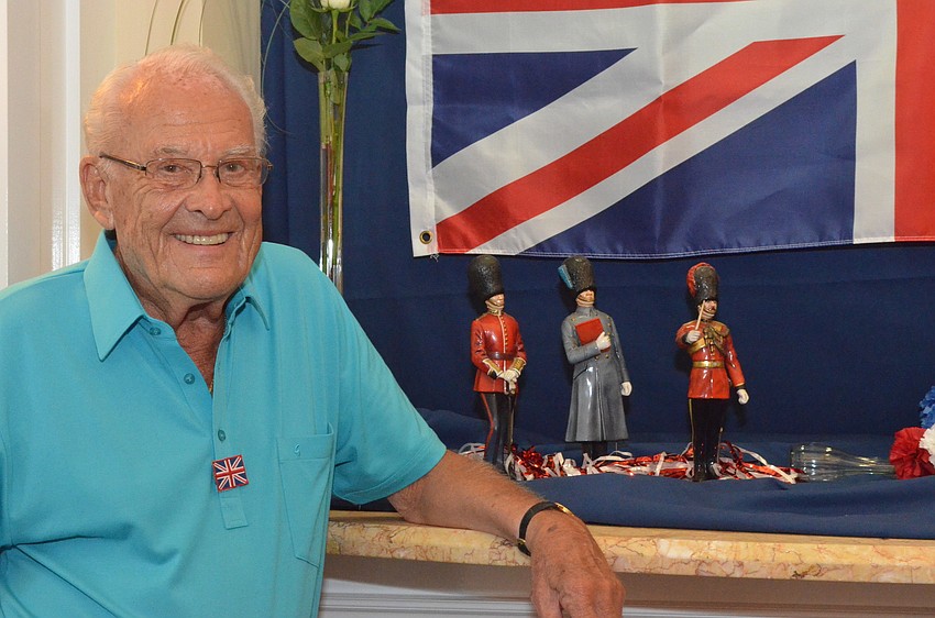 Herb Jones stand with the collection of small Royal Guards sculptures his late wife Doreen had given him for Christmas when they lived in the United Kingdom.