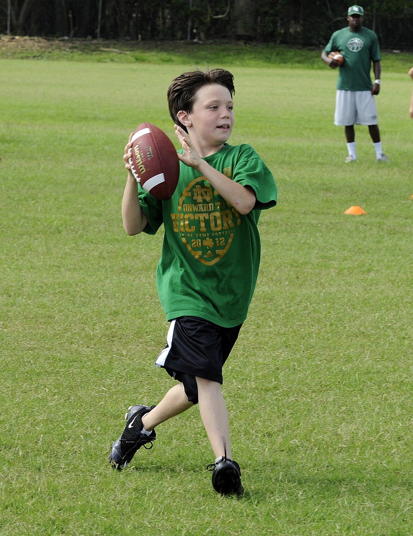 Tighe Basso, 10, enjoyed learning new things to help improve his football skills.