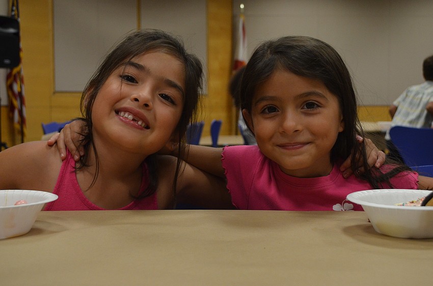 Mojdeh Khoshia, 7, and her sister Atussa recently moved to Sarasota from Boston with their parents.