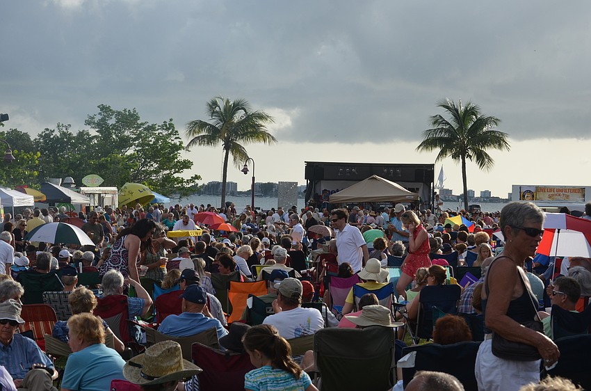 Hundreds of people packed the lawn of the bay at the Van Wezel.