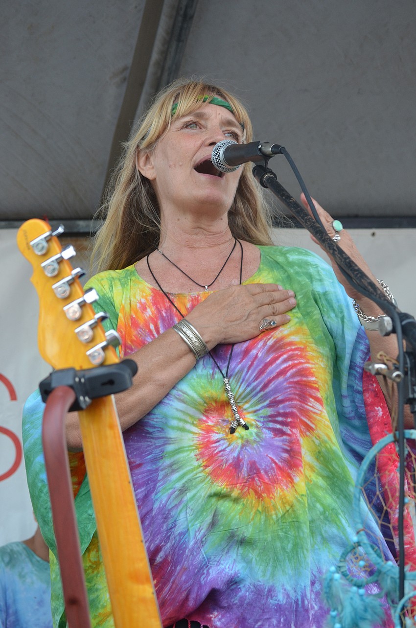 Mary Lu Kinlaw entertains the crowd with music of her youth.