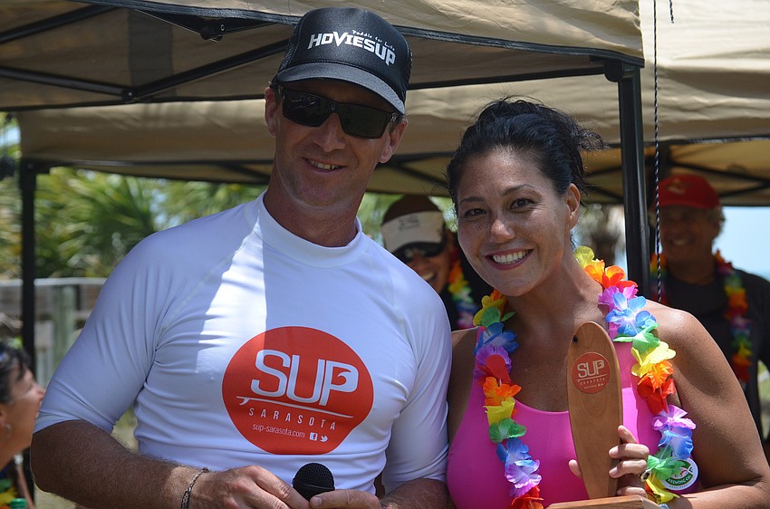 Founder of the Sarasota Stand Up Paddle Board Series Rob Alfieri and third place winner in the womenâ€™s open Kat Lucchesi