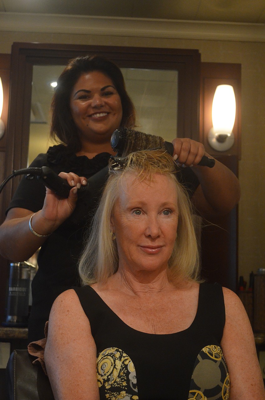 Hair stylist Raquel Ruiz gives Katie Cornellâ€™s hair volume. She has 13 years of experience and taught ladies to brush and blow dry hair away from the scalp for added volume.