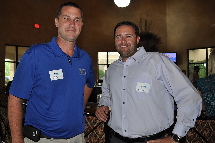 Joe Ernst, of D&D Garage Doors, and Jeff Balser, of Lighthouse Property Management