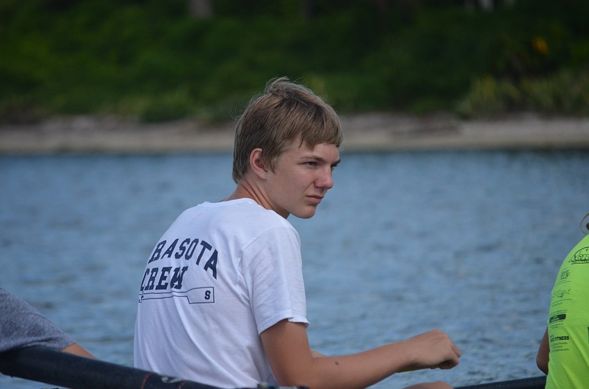 Cian Graue listens to a camp councilorâ€™s instructions.