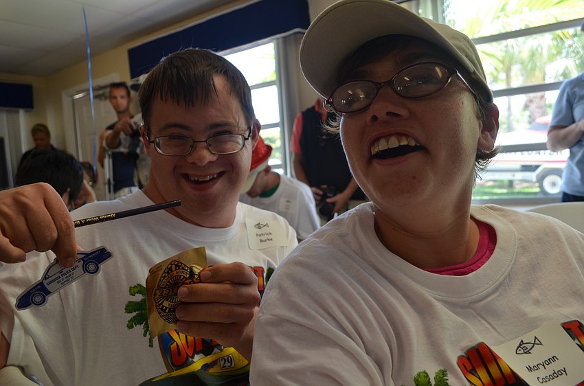 Patrick Burke and Maryann Casaday enjoy the celebration after the fishing trip.