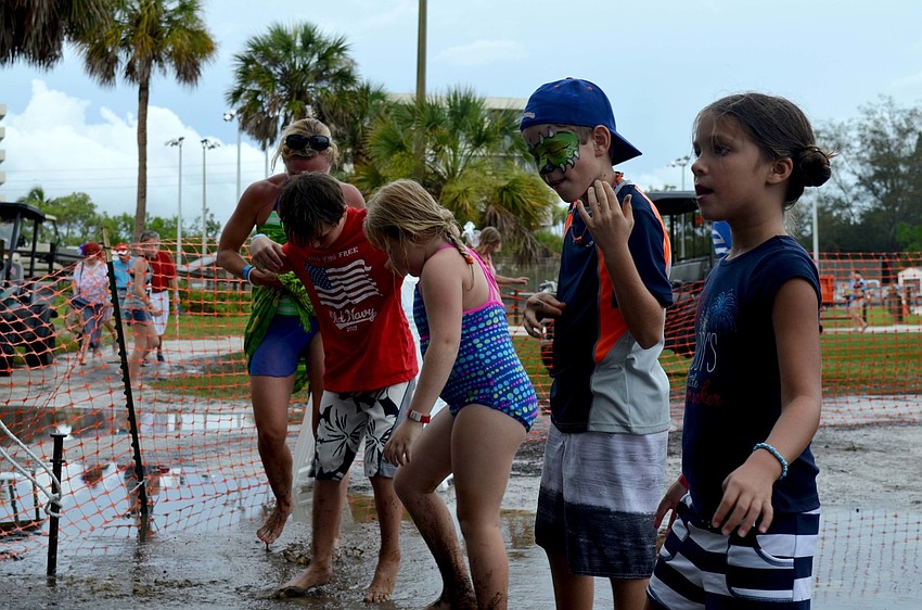 Children dance to the live band