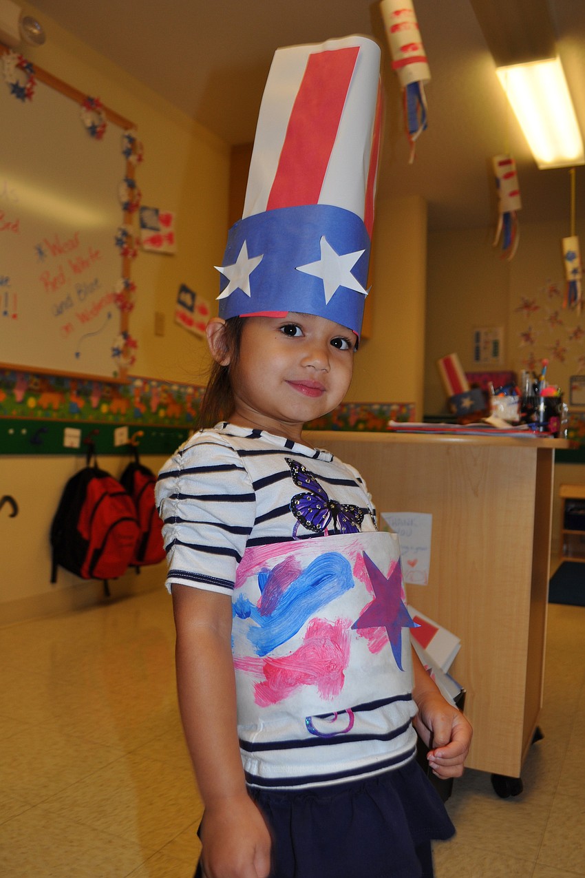 Three-year-old Layla Bianes wears an Uncle Sam-inspired hat.