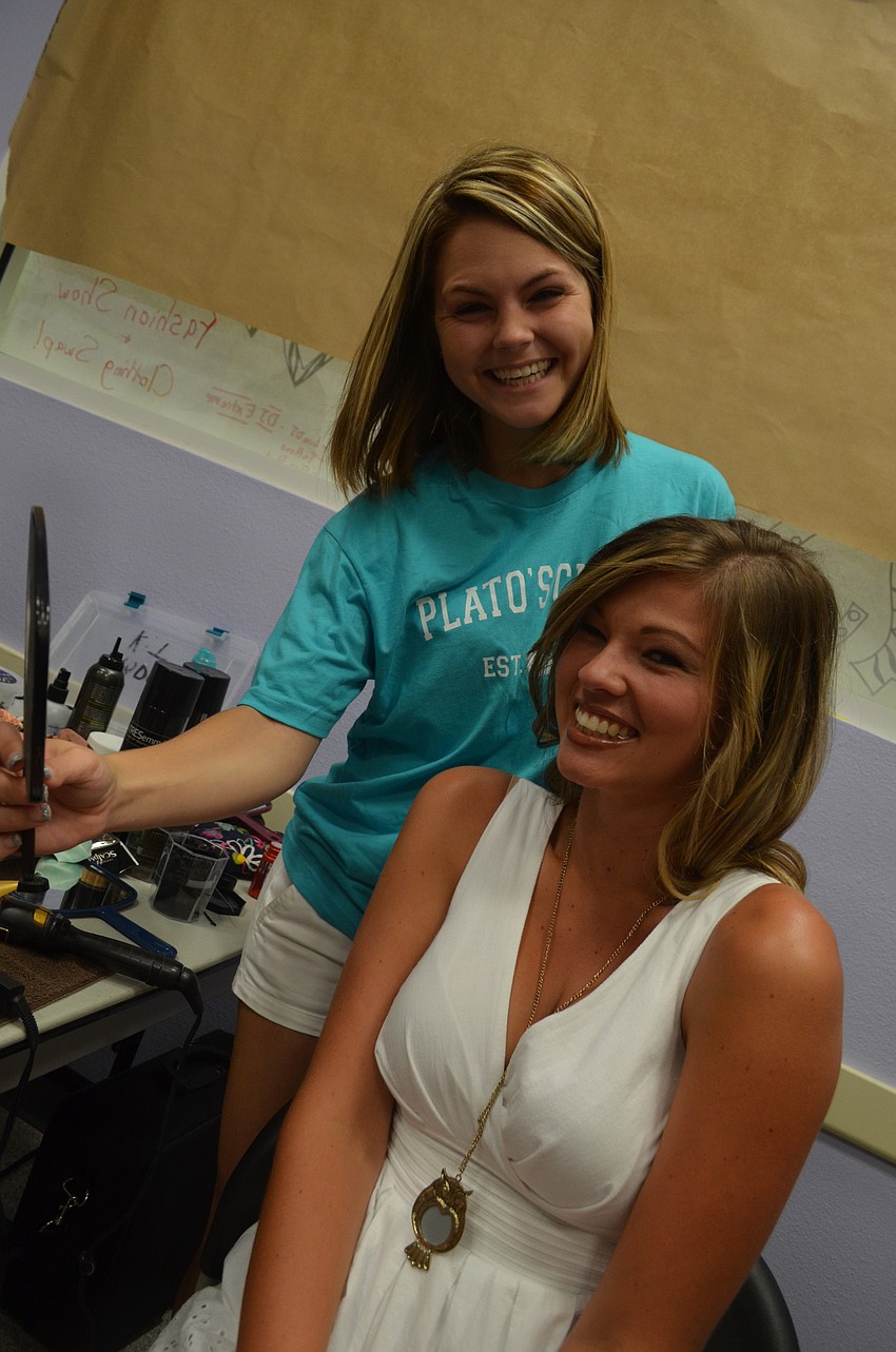SCTI Cosmetology student Whitney Williams does model Payton Zimmermanâ€™s hair.