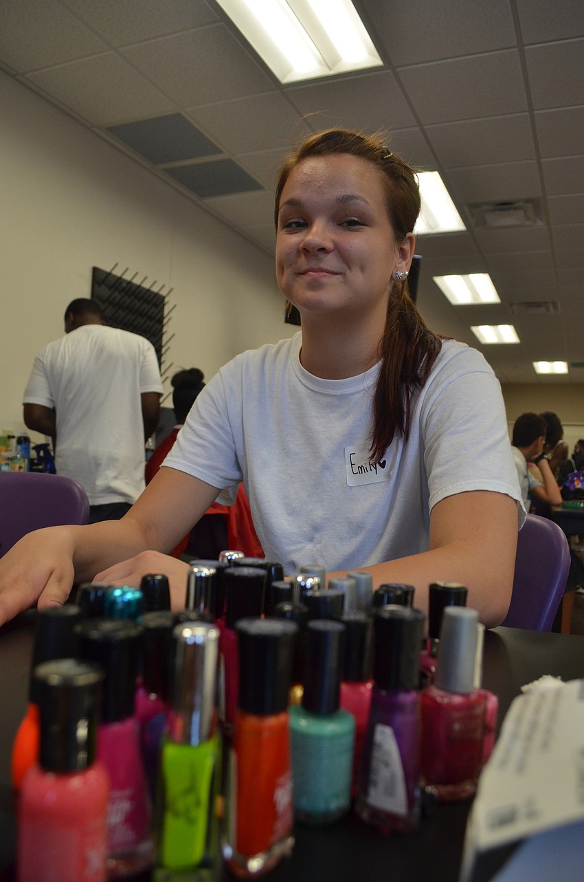 Fifteen-year-old Emily Alday gets a manicure during the Fifth Annual Day of Hope.