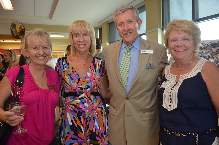 Maria Mesarosova of Impulse Realty LLC, Oma McCall of the Greater Sarasota Chamber of Commerce, Phl King of The Glasser Schoenbaum Human Services Center and Carolyn Eagen of Mental Health Community Center