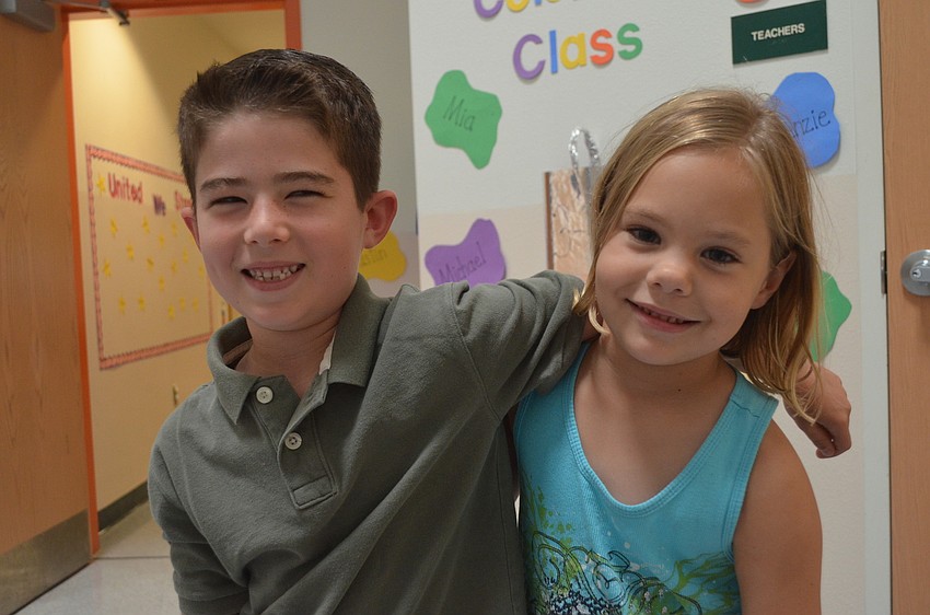 Brenden Canale, 7, is entering second grade. His friend Cecilia Cosgrove, 6, is entering first grade at Wakeland Elementary.