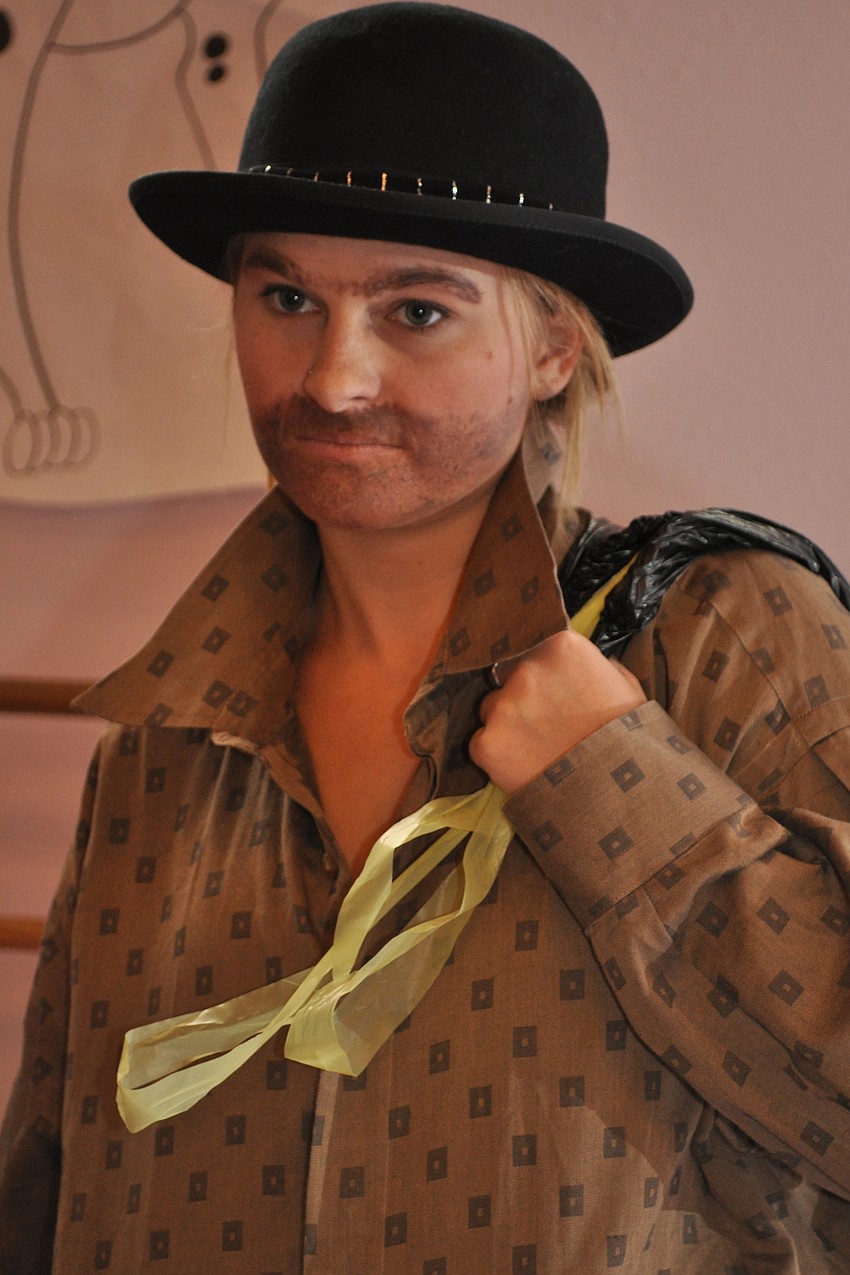 Karlie Tomkinson plays Gus, the burglar.