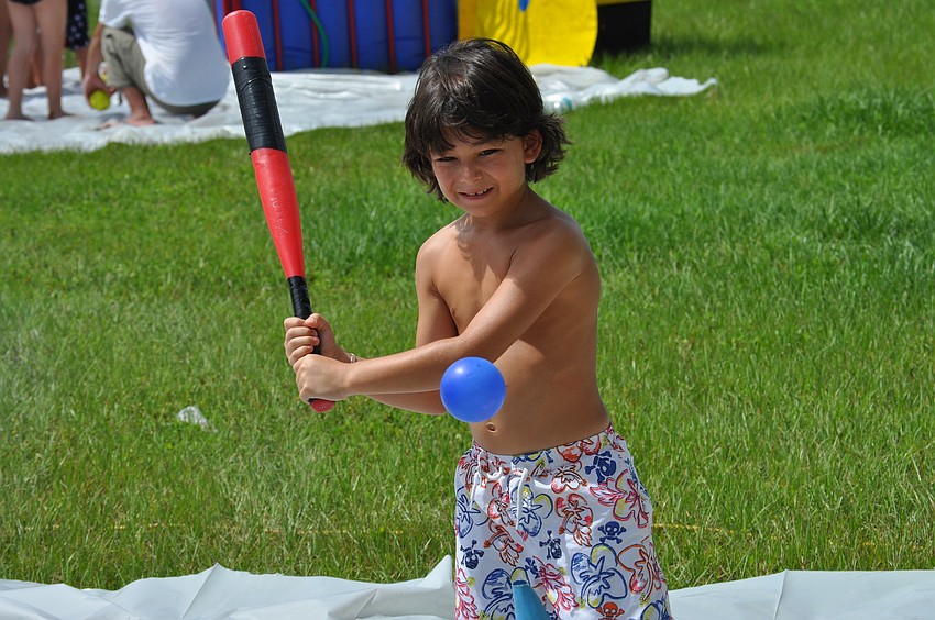 Nico Serrano, 7, sized up the wiffle ball.