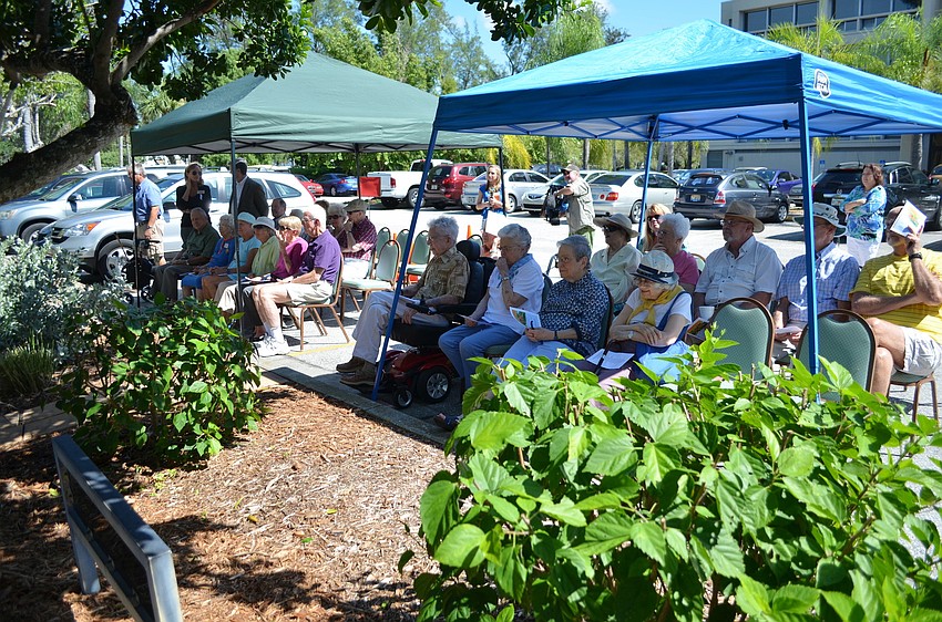 Plymouth Harbor residents attend the dedication of Tilleyâ€™s Butterfly Garden.