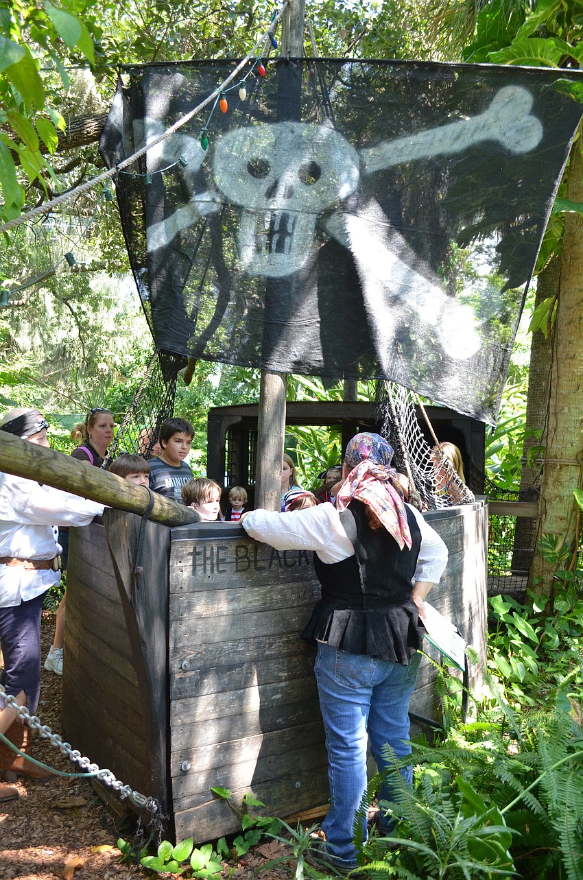 The children set sail on the Black Pearl before they embark on the treasure hunt.