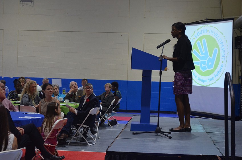 Riverview High School junior Danielle Richardson introduces Chef Paul Mattison.