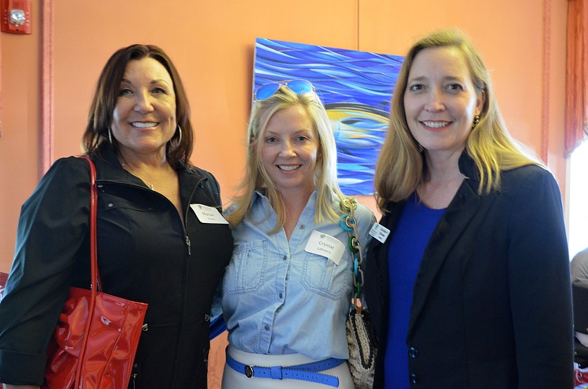 Marian Price, Crystal Lahners and President of the Conservation Foundation Christine P. Johnson