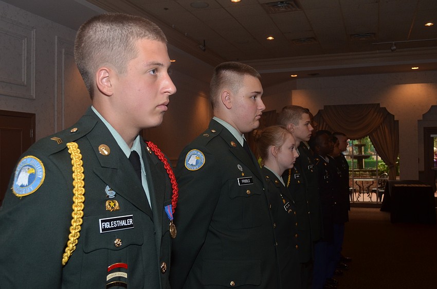 Sarasota Military Academy sophomores Matthew Figlesthaler, Matthew Pribble and Laura Gwilliam