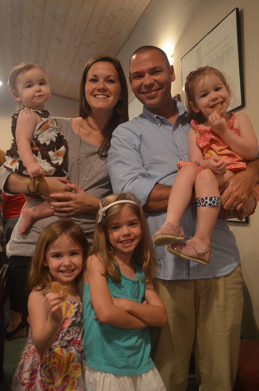 Eric and Sarah Hoskins with their daughters Mollie, 1, Campbell, 4, Adelai, 6, and Ellington, 3