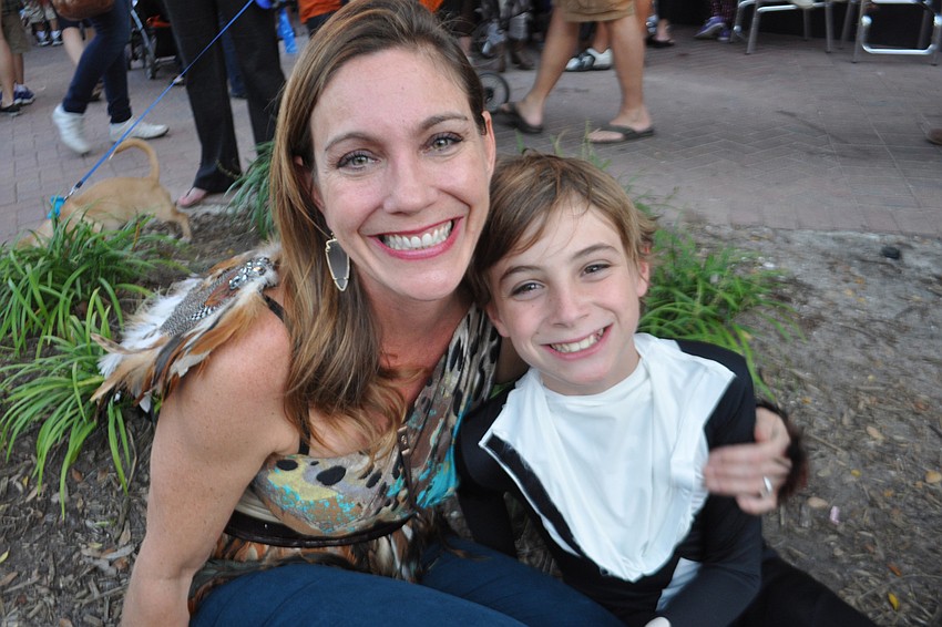 Michelle Frenchman sat with her son Sebastian, 9.