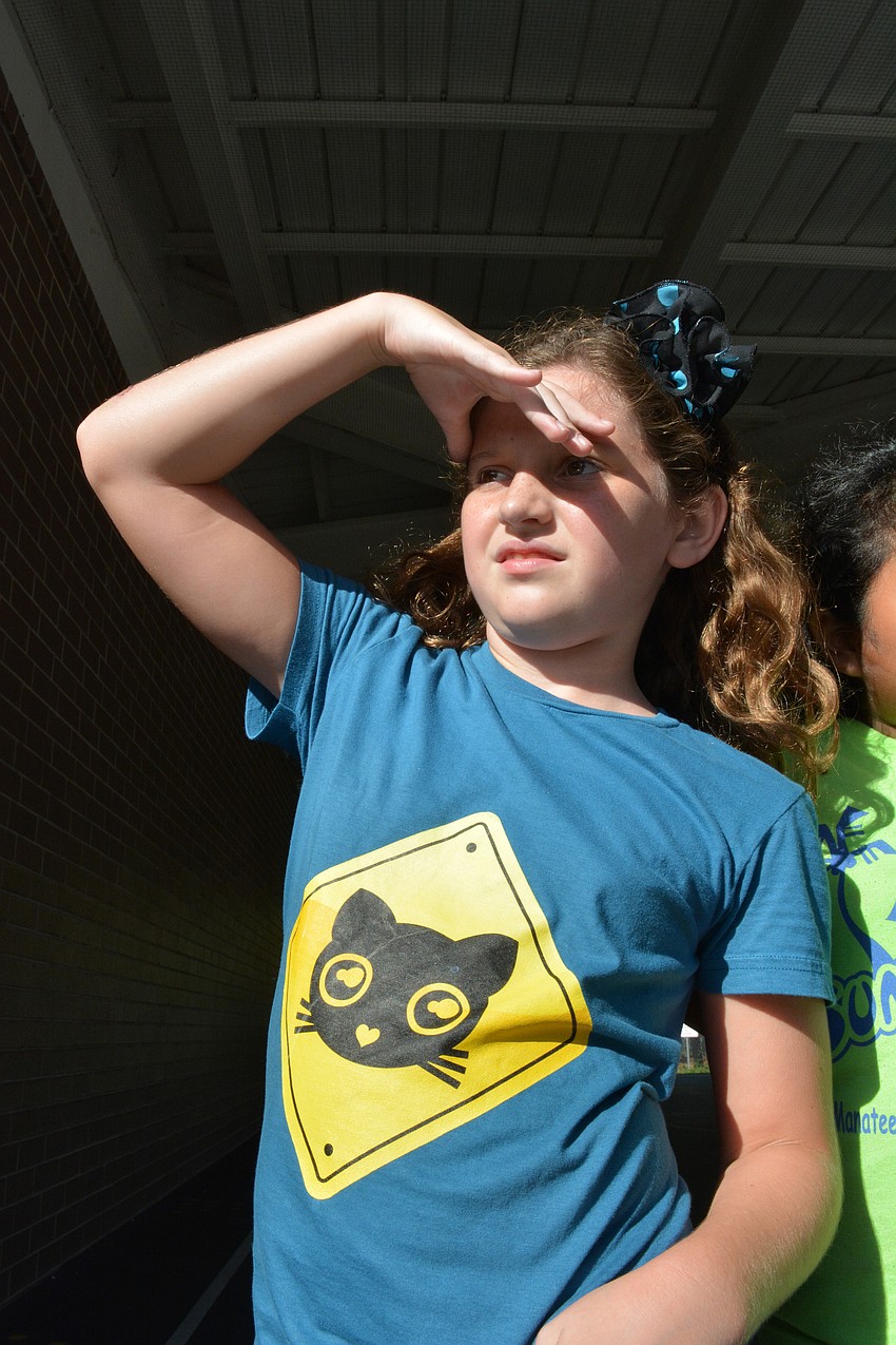 Sophia Mierzwinski watched victims of the dunk tank.