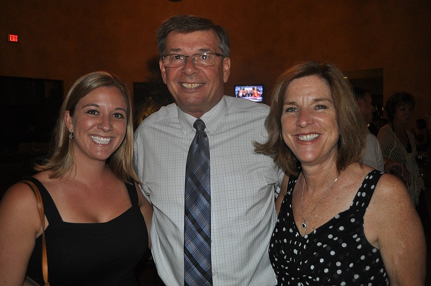 Laureen Vassallo, the McNeal PTO vice president, with Randy and Mary Sue Bauer