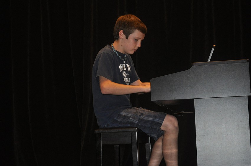 Connor Landers, an eighth grader, is a self-taught piano player.