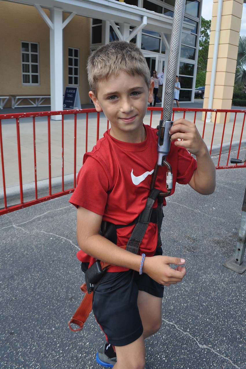 Aidan Marino made it to the top of the rock-climbing wall easily.