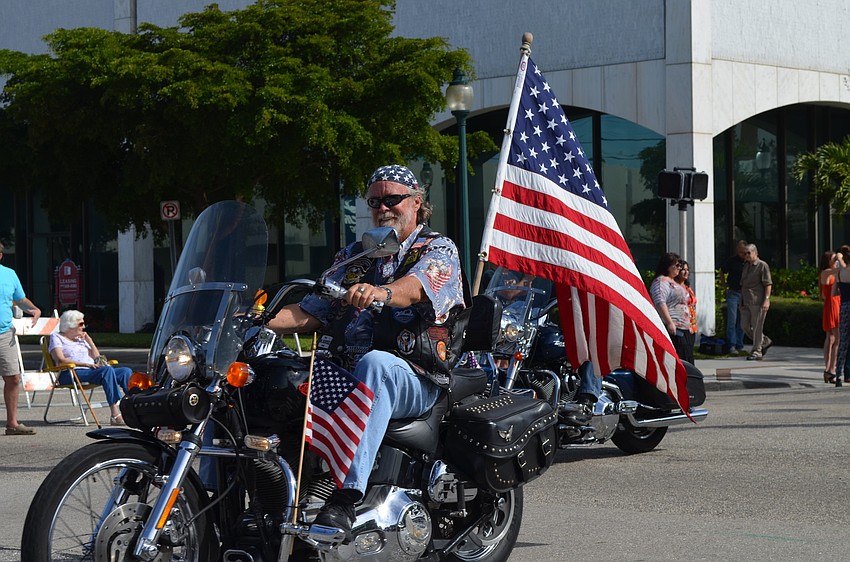 The parade included motorcycles