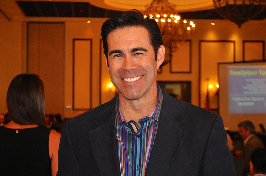 Tim Wilkins, an area resident and comedian, cracks jokes and receives laughs in between award presentations.