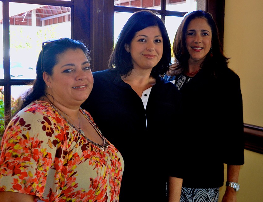 Fran Jensen, Jennifer Barbaro and Kimberlie Buchanan share laughs.