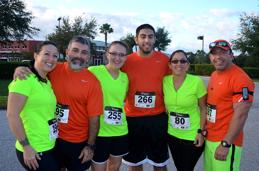 Courtney and Chris Tesvich, Rowan Salzl, Jacob, Lupe and Blaise Tesvich.