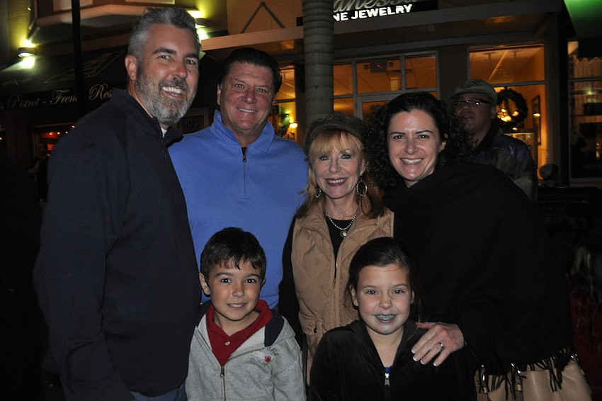River Strand residents Jack and Gayle Mutchnick, center, came with their family, Ben, Will, Amilia and Maggie Hilton.