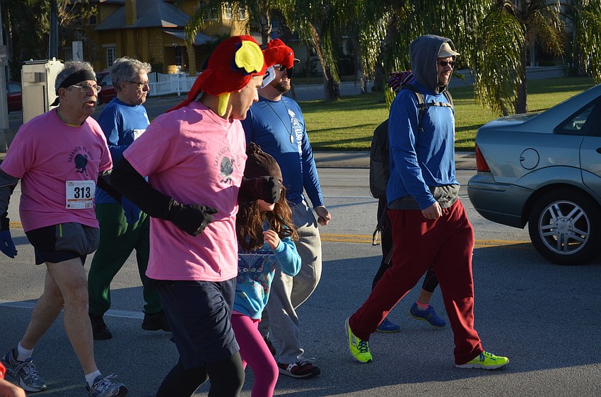 Runners pound the pavement for the Turkey Trot 5K.