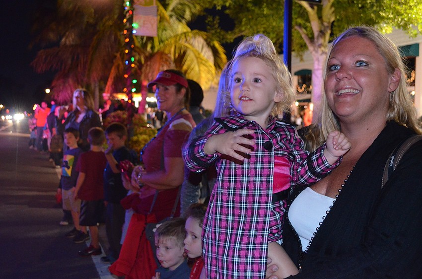 Josie and Dana Bremer watch the parade.