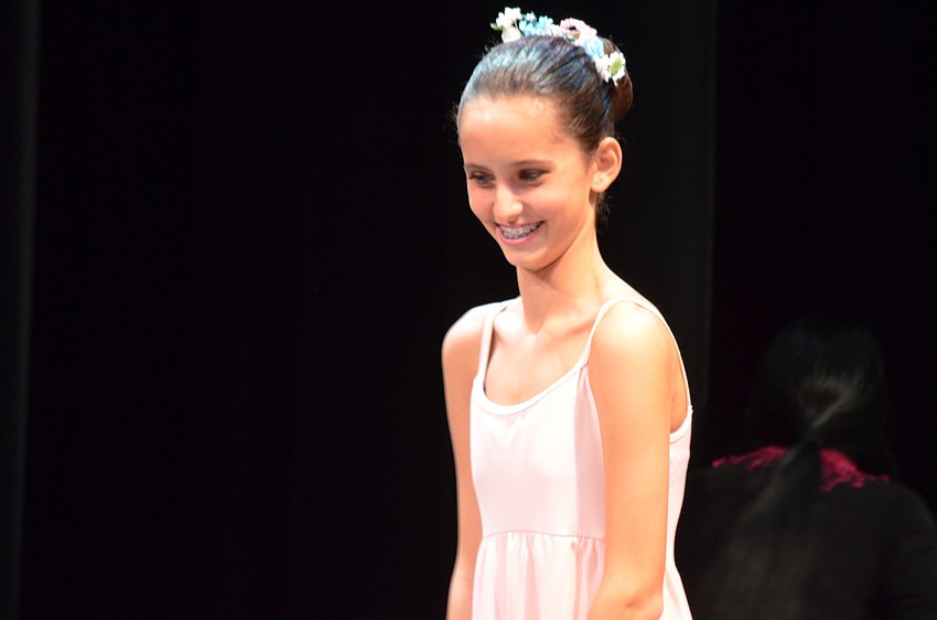 Angelica Salustri applies blush before the performance