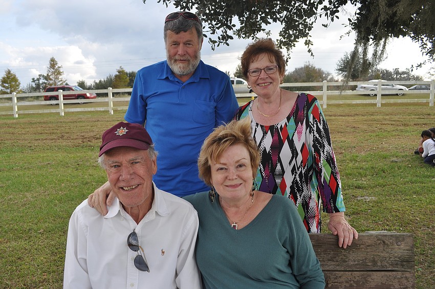 (Back) England residents Hedley and Jane Swannell met (Front) Terry and Melissa Martin of Bradenton at the event.