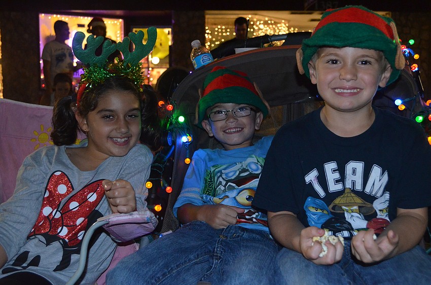 Gianna Helm, Jacob Todd and Benjamin Todd dressed as elves