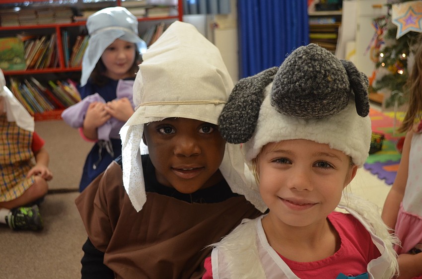 Qui'niyah Monix wears her shepard costume while Chesney Beckman plays a sheep