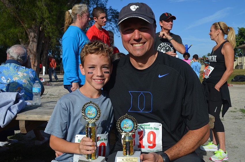 Grant Collins was first in his age group while dad, Scott, came in third in his age group.