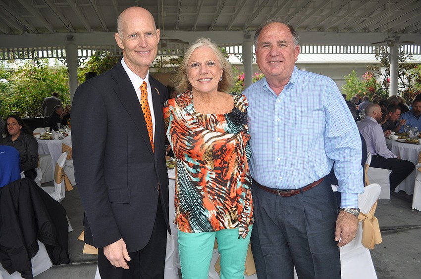 Gov. Rick Scott with Janet and Dean Mixon