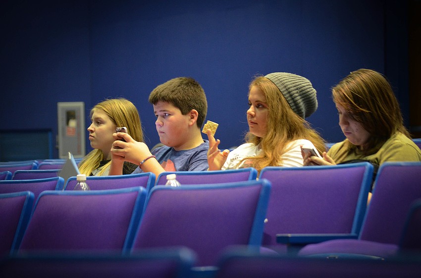 Between running scenes, learning to fly and sword fighting, Brenna Nopper, Jack Kirsch, Melissa Hampton and Brooke Bertelsen snacked and socialized.