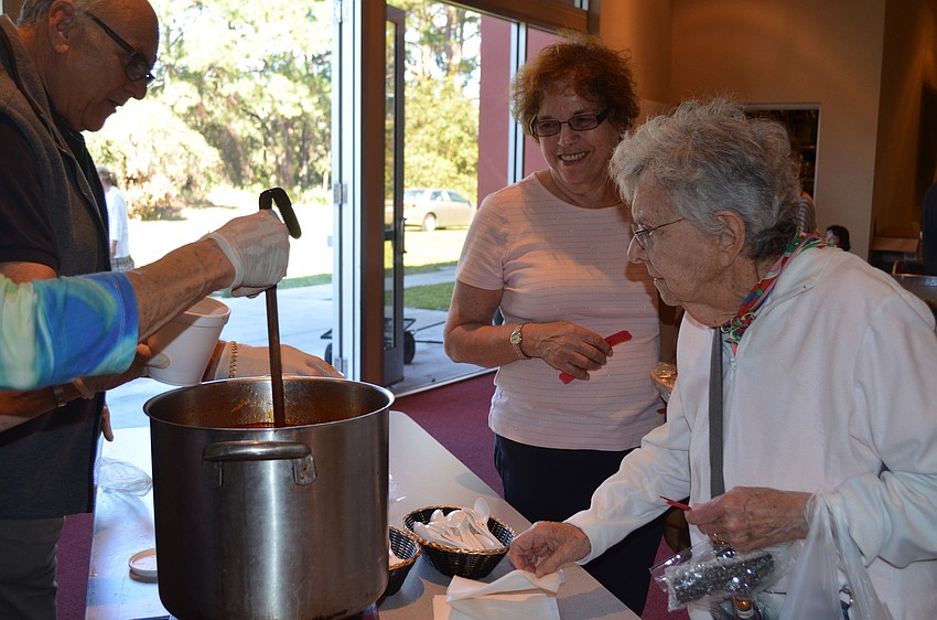 Tobe Gerson gets a serving of cabbage soup.