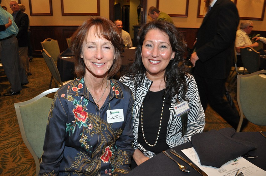Carolyn Sanchez, of Enterprise Executive Suites, with Yasemin Chain of ComCenter