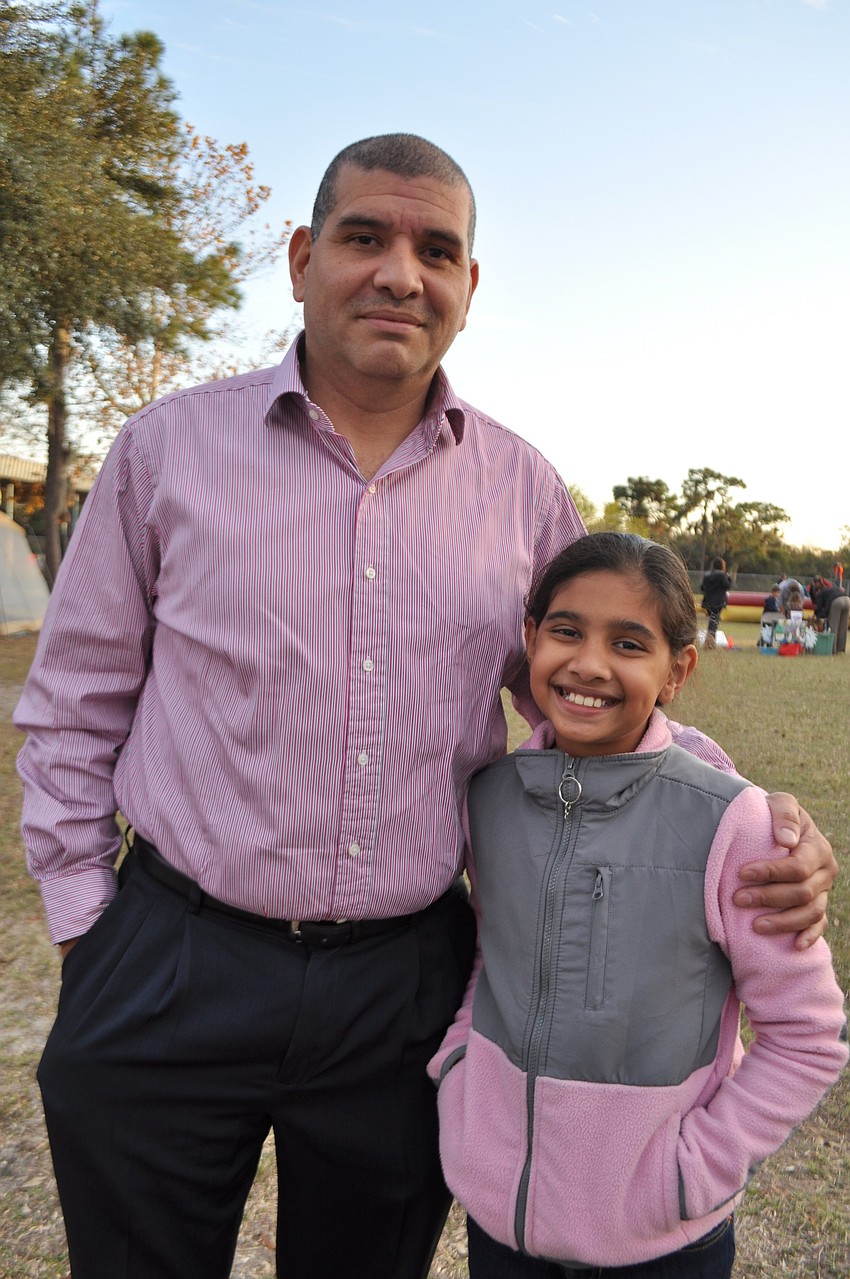 Jamie and Emily Giraldo ready to battle with snowballs.