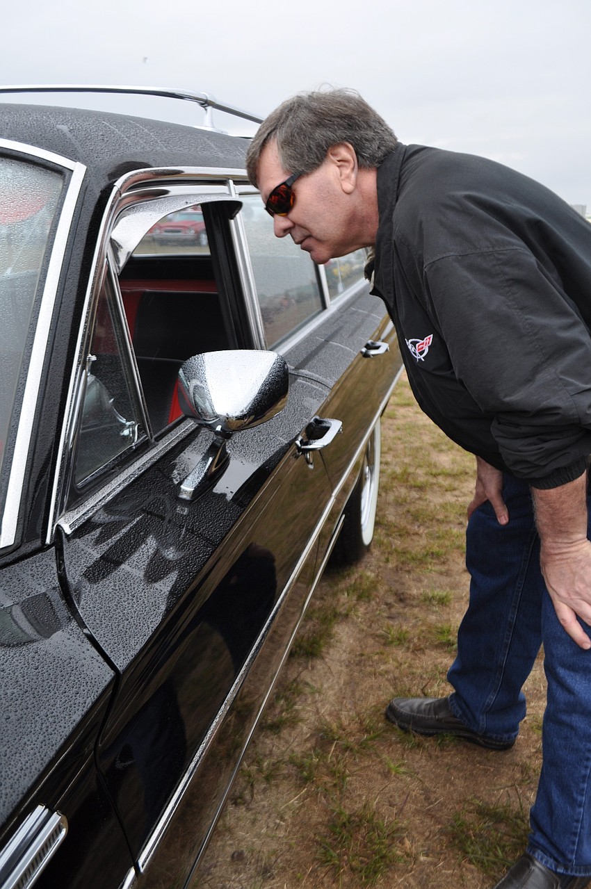 Creekwood's Nick Monaco checks out a vintage Buick.