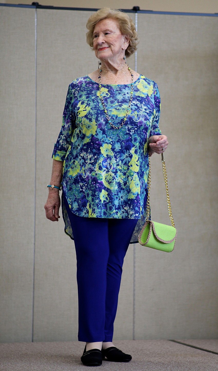 Evey Huntington models a blue and green number from Patchington.